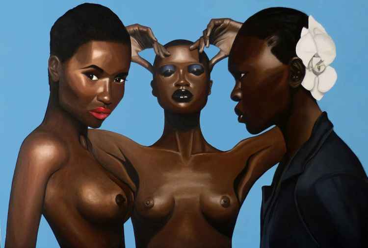 3 women and a blue background