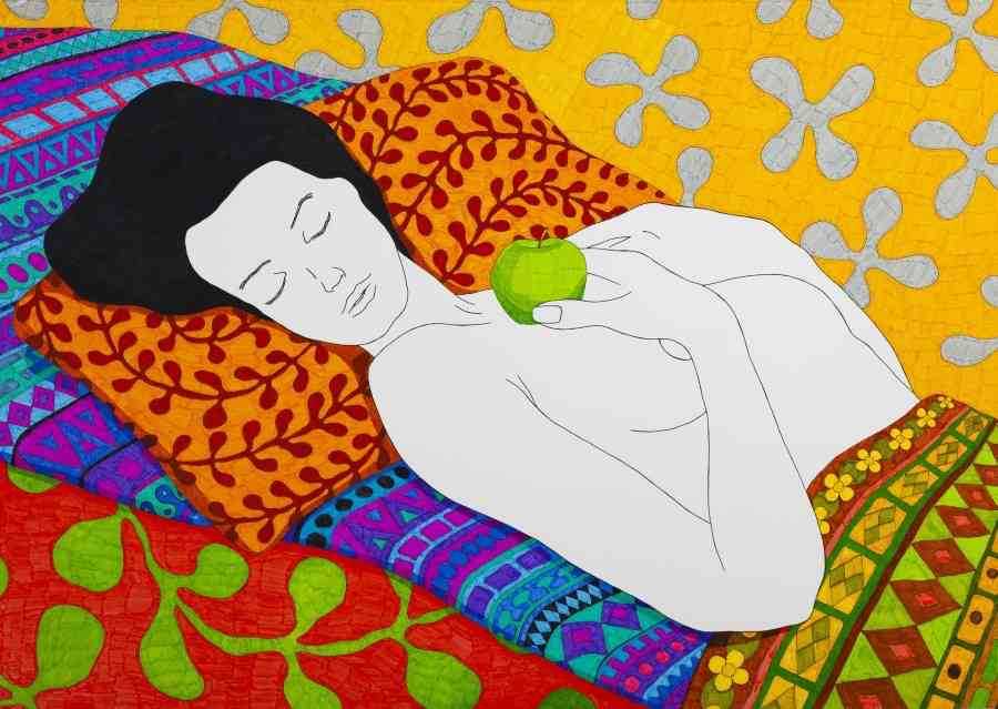 Sleeping with a bright green apple
